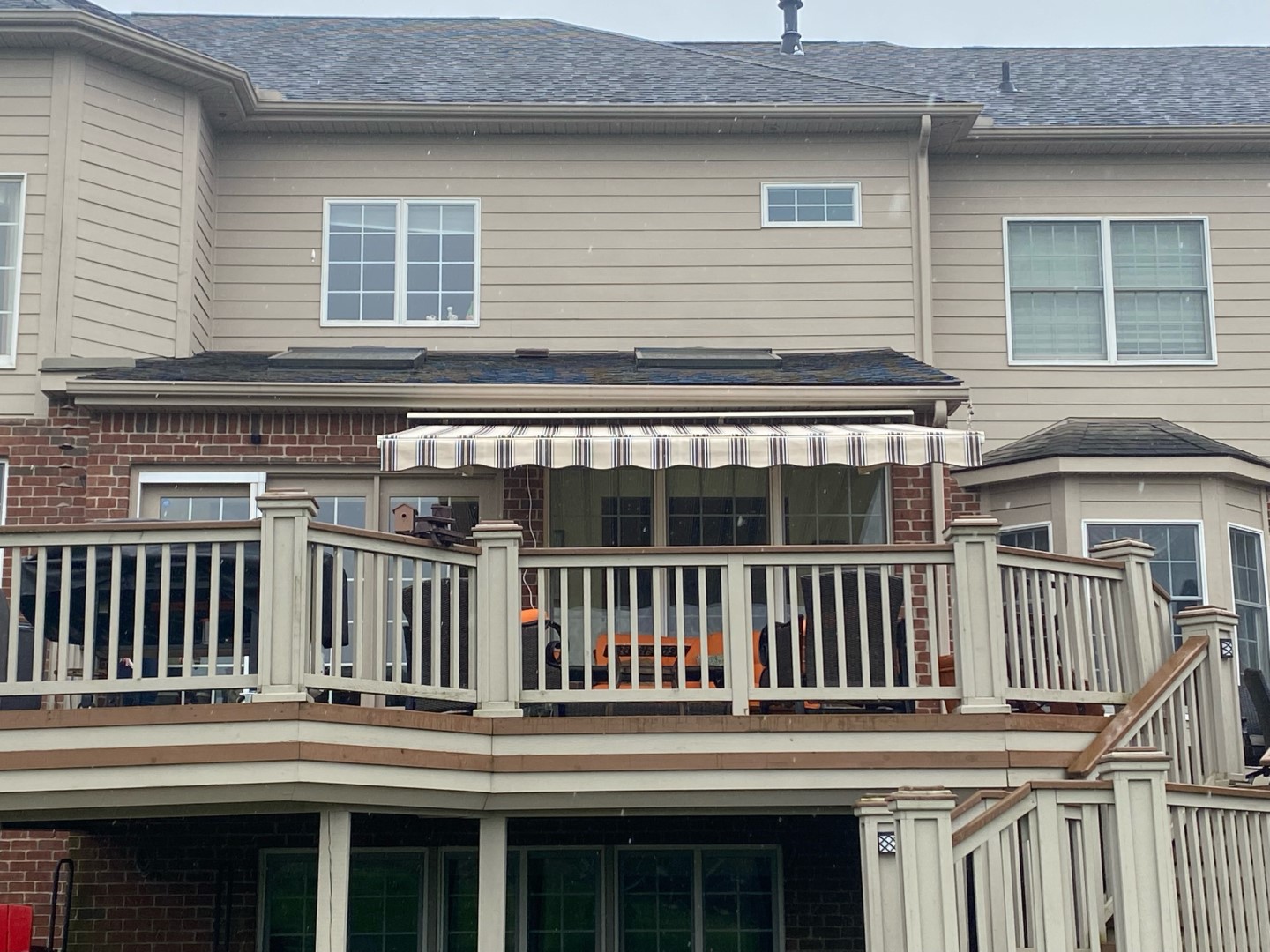 Roll-up awning installation in Northville Michigan by Mad Dad Handyman